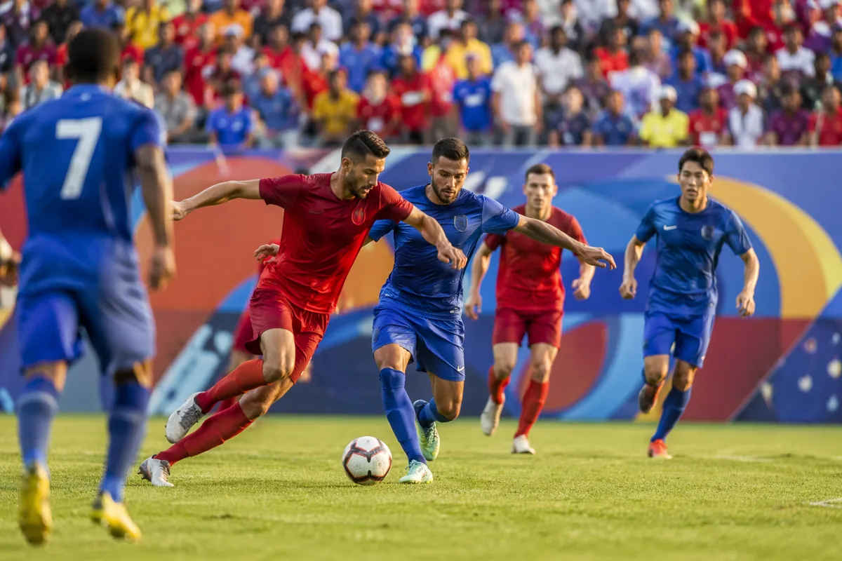 Professional football editorial header image, bright outdoor stadium atmosphere, two teams